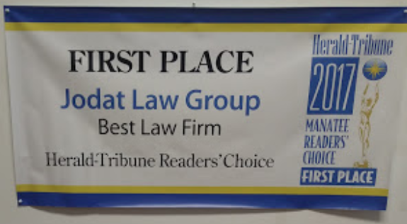 Jodat Law Group award from Herald-Tribune